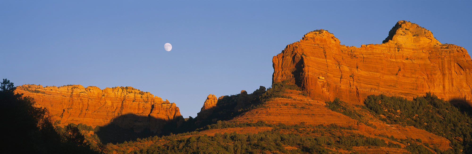 Low Angle View Of Moon Over Red Rocks, Sedona, Arizona, USA Wall Mural