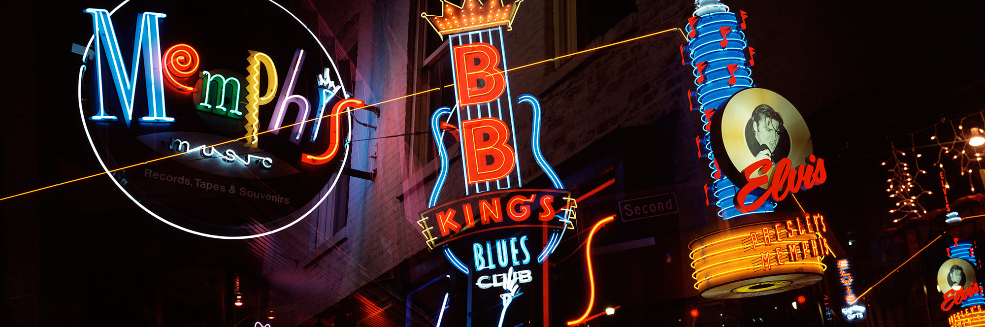 Low Angle View Of Neon Signs Lit Up At Night, Beale Street, Memphis, Tennessee, USA Wall Mural